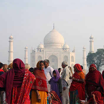 crowd of indian people in front of taj mahal