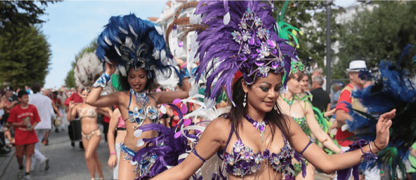 women dancing samba at a carnival