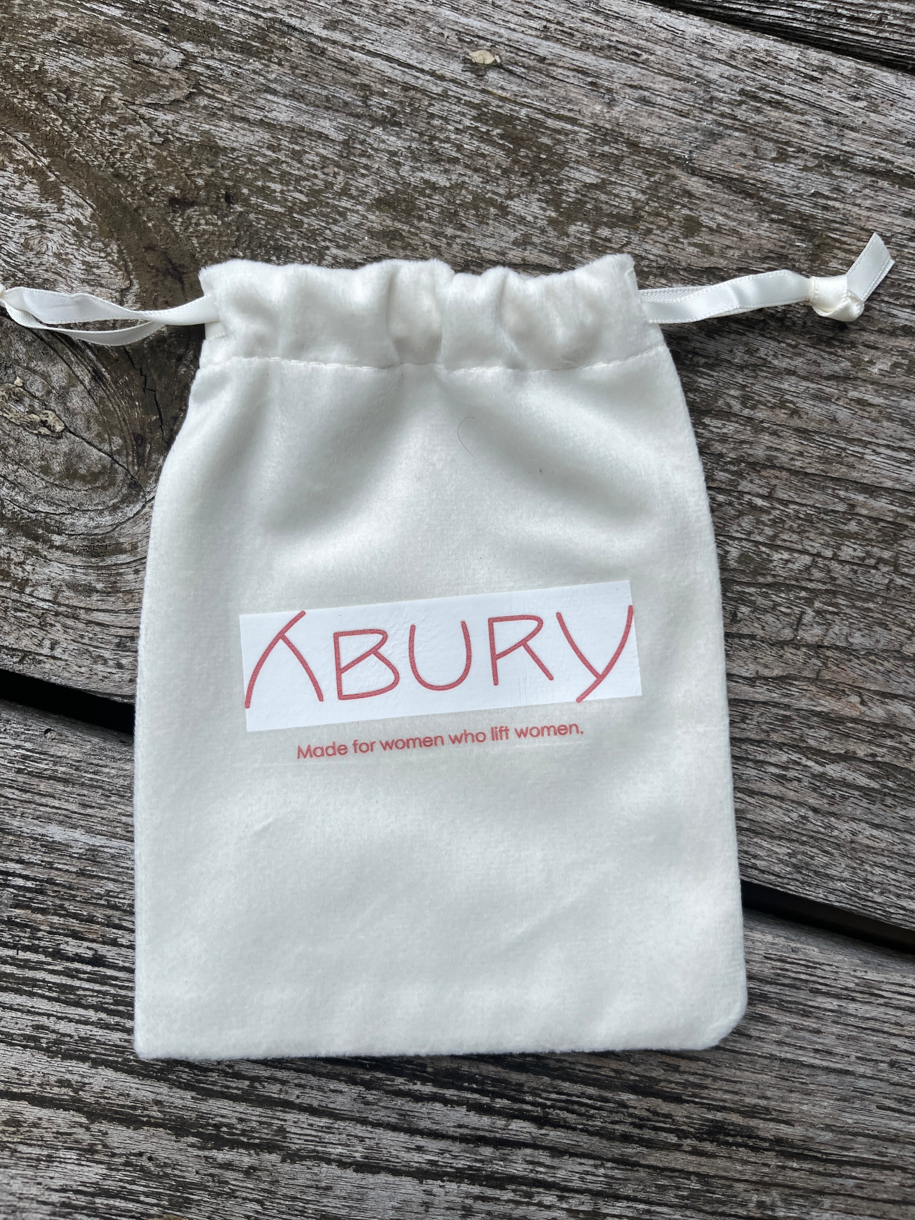 Pompom Schlüsselanhänger aus Leder mit Logo