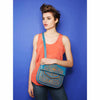 model wearing blue and orange embroidered ABURY Leather Berber Shoulder Bag