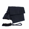 side view black abury cotton clutch bag with tassel
