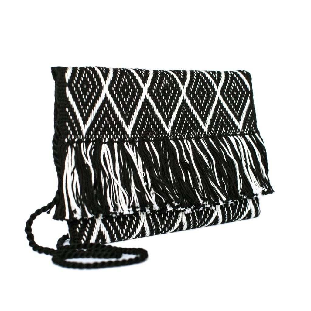 side view white and black abury zigzag cotton clutch bag