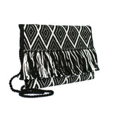 side view white and black abury zigzag cotton clutch bag