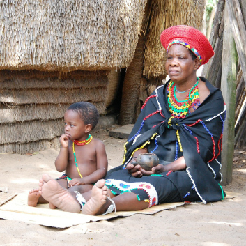 mwoman and child with traditional outfits from south africa