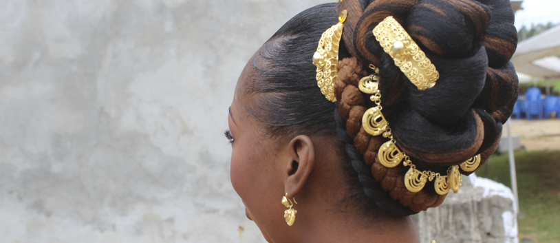 woman wearing hair ornaments in ivory coast