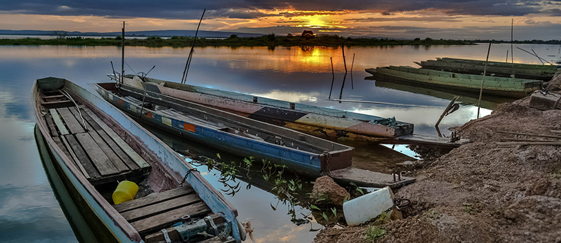 fishing boats at sunset in tanzania