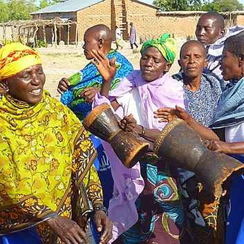 women in tanzania with drums